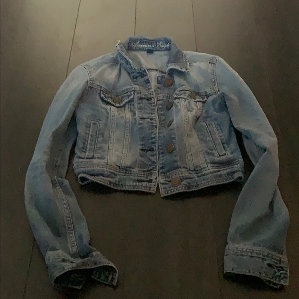 Cropped medium wash denim jacket